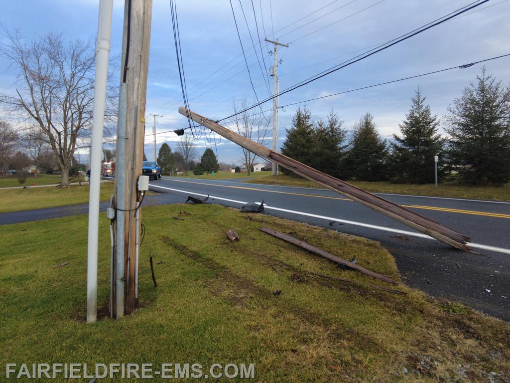 Utility pole and mailboxes damaged as the result of this accident.  Looking North on Orrtanna Rd.