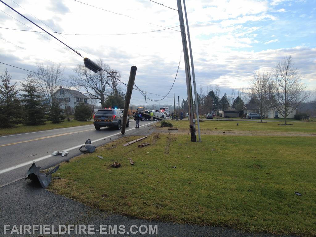 Damaged utility pole.