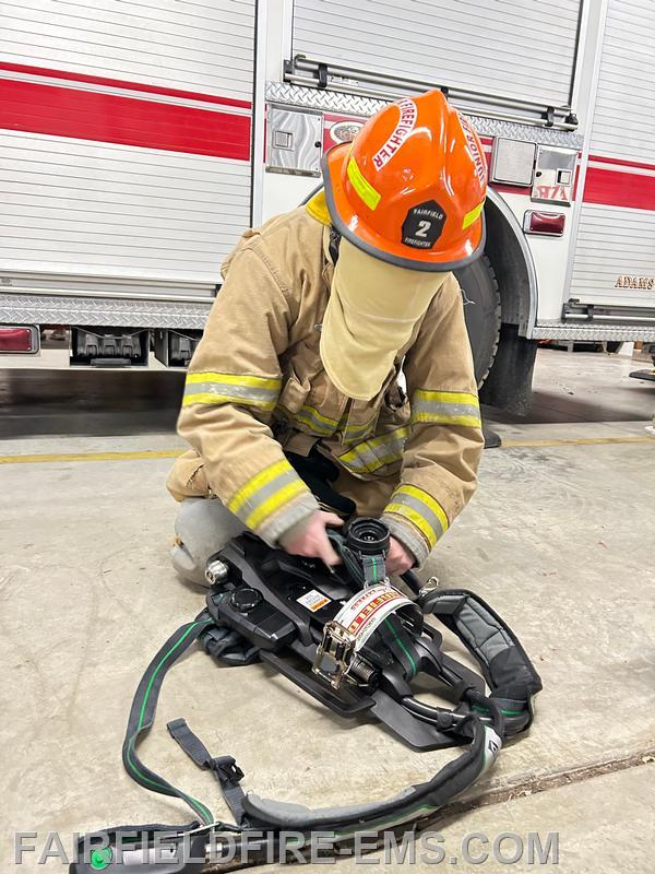 Firefighter Packing Fairfield Fire & EMS